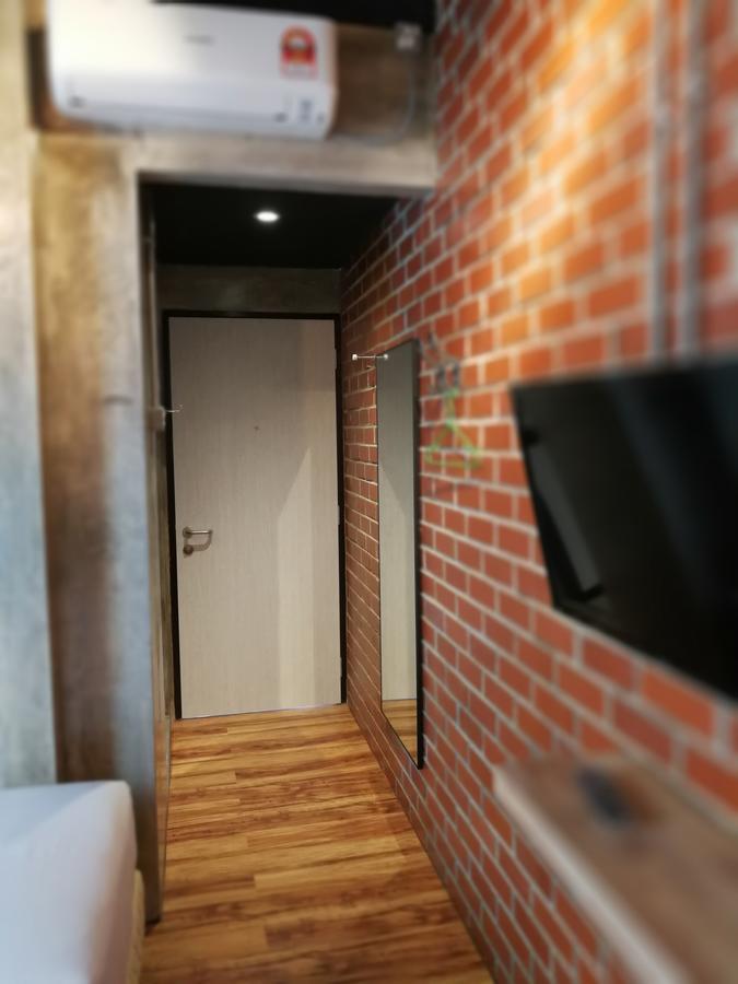 ホテル ザ ライズ ルーム クアラ・トレンガヌ エクステリア 写真 A corridor in a house