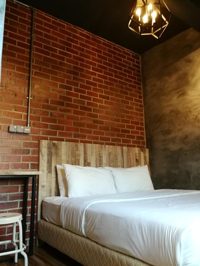 ホテル ザ ライズ ルーム クアラ・トレンガヌ エクステリア 写真 A bedroom at the hotel
